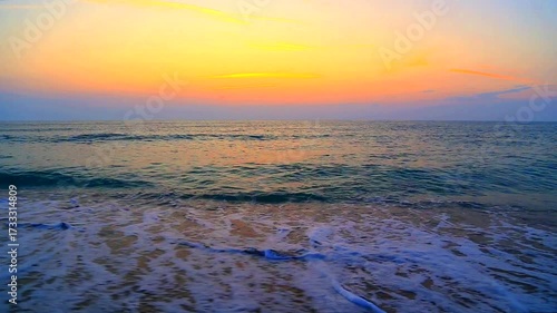 Beautiful summer sunrise over the beach