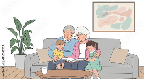 An elderly couple lovingly reads a story to their two young grandchildren while sitting comfortably on a living room sofa.
