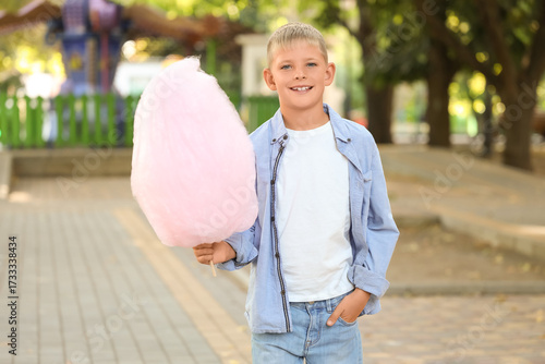 Teen boy with cotton candy ...