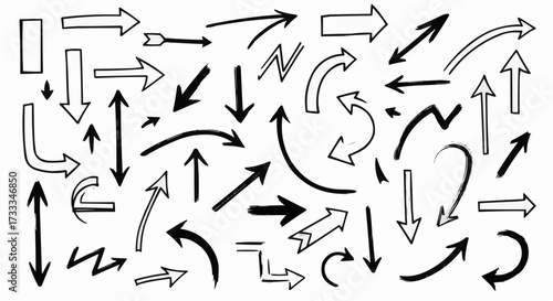 Collection of hand drawn arrows and directional symbols on white background