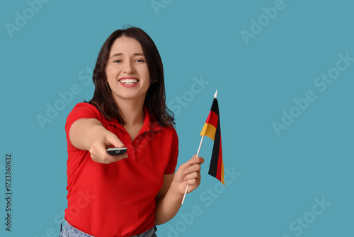 Young woman with remote con...