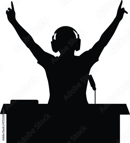 Silhouette of a dj with arms raised in celebration