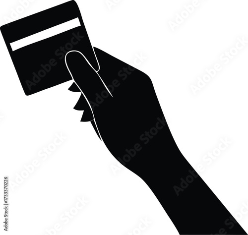 Silhouette of a hand holding a credit card