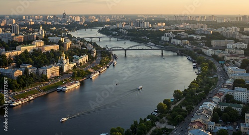 Wallpaper Mural Aerial view of a wide river flowing through a cityscape at sunset Torontodigital.ca