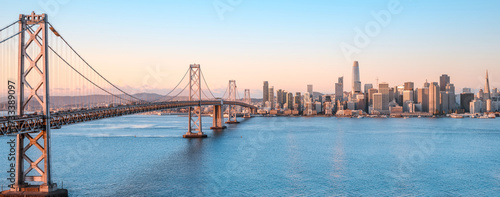 The skyline of san francisco and the oakland bay bridge during sunrise