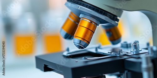 Close-up lab microscope with orange lenses