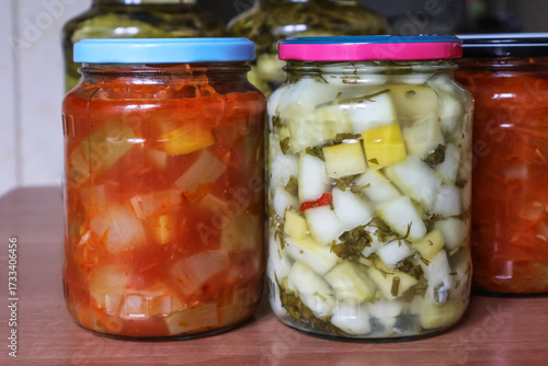 Healthy food concept with zucchini pickles in assorted brines
