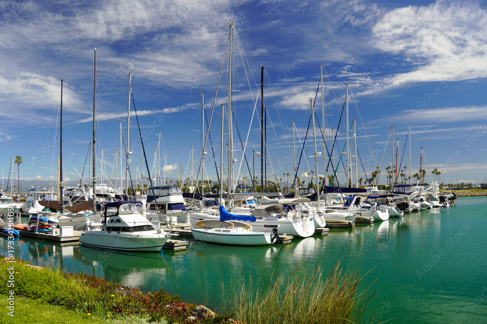 Fototapeta premium Boats Docked at Oxnard Marina on a Sunny Day in California