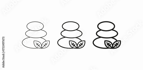 stacked stones with leaves icon sign vector