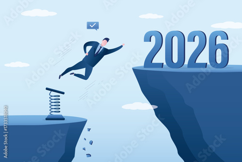 Businessman uses metal spring and jumping over abyss to new 2026 year. Overcoming obstacles. Business prospects in 2026, vision of future success, achievement targets in new year