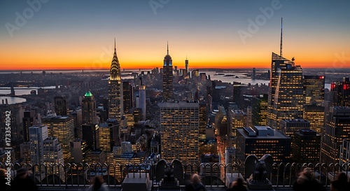 Panoramic view of the illuminated New York City skyline at dusk