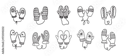 Hand drawn winter mittens. Doodle cute mittens elements black on white.