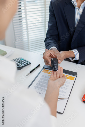 Business negotiation for car purchase shown with toy car models, car keys, calculator, and contract agreement. The images illustrate consultation, signing process, and financial decision.