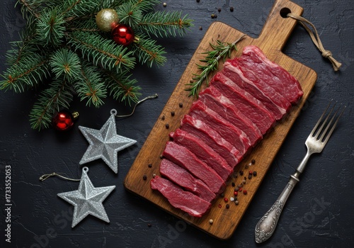 Raw Steak on Wooden Cutting Board with Christmas Decorations