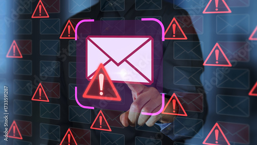 Email security software detecting phishing or scam mail and displaying warning alert. Business person touching email icon to delete malicious emails.