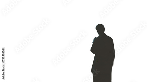 Enigmatic Silhouette: A Man's Quiet Reflection in the Darkness Unveiling a Mysterious Figure
