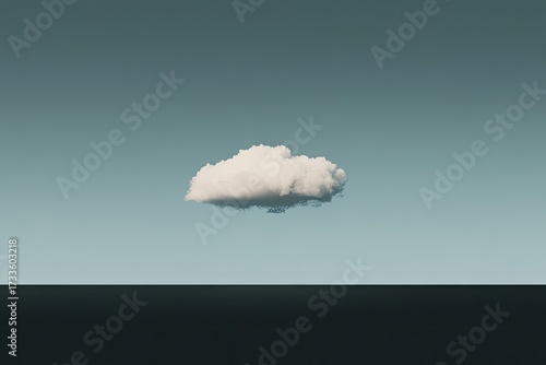 Lone cloud hovers above dark horizon in minimal landscape