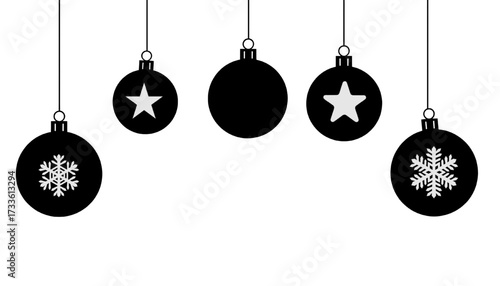 minimalist black and white christmas ornaments hanging on strings