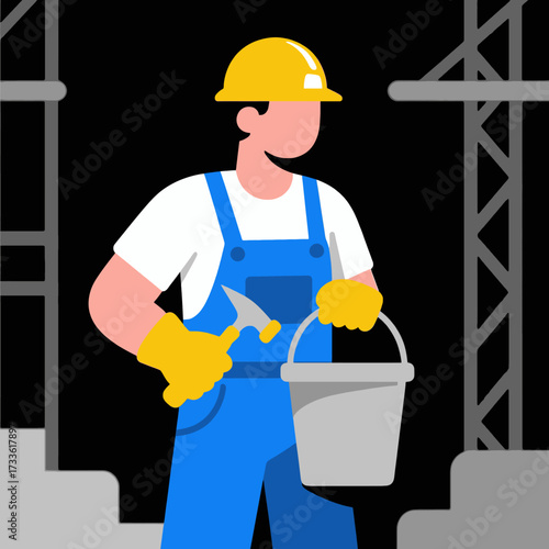 Determined construction worker with hammer and bucket under industrial scaffolding at night