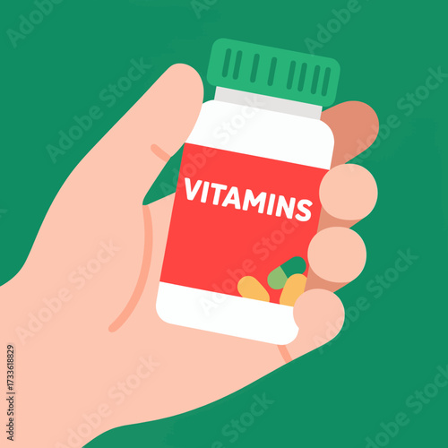 Hand holding vitamin bottle with colorful pills, vibrant green background, health and wellness theme