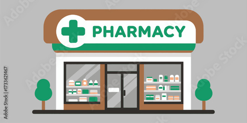 Modern pharmacy storefront with green cross sign under clear sky