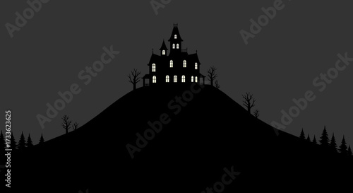 Spooky Silhouette A Haunted House on a Hill with Glowing Lights Under a Dark Sky for Halloween