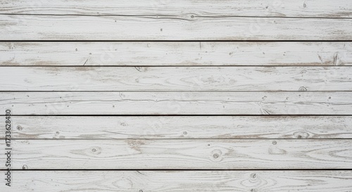 Weathered white wooden planks with natural grain patterns and knots. The aged timber surface shows authentic wear with subtle cracks and imperfections, perfect for rustic backgrounds.