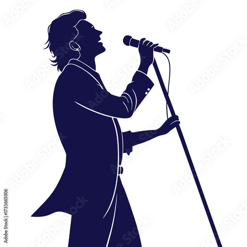 Silhouette of a male singer in a tuxedo performing with a microphone