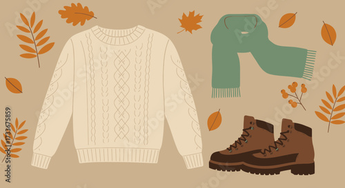 Cozy autumnal outfit featuring a cable knit sweater, warm scarf, and sturdy hiking boots surrounded by falling leaves and berries