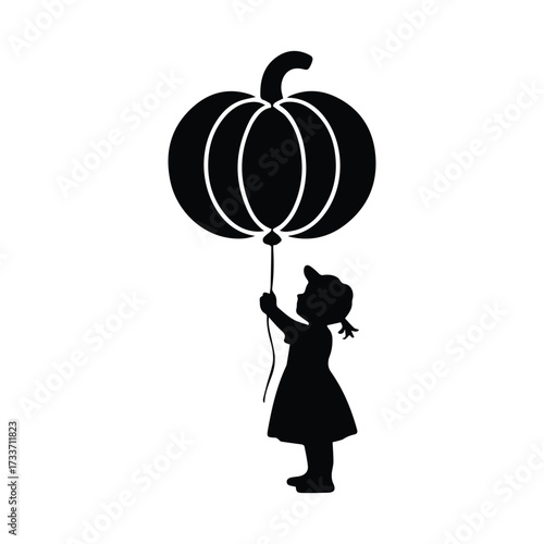 Silhouette of a young girl holding a large pumpkin-shaped balloon against a plain background silhouette