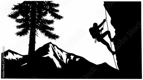 A silhouette of a climber scaling a rock face next to a pine tree and mountain range in black and white