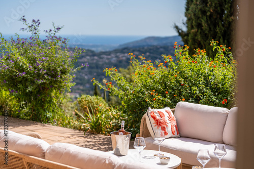 Elegant terrace with sea view and champagne setup in Provence