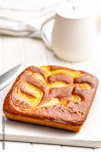 Catalana sponge cake on white table.