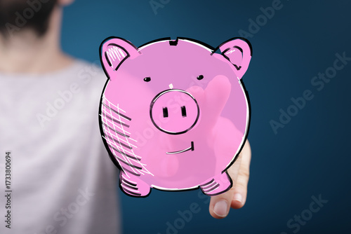 Hand holding digital piggy ...