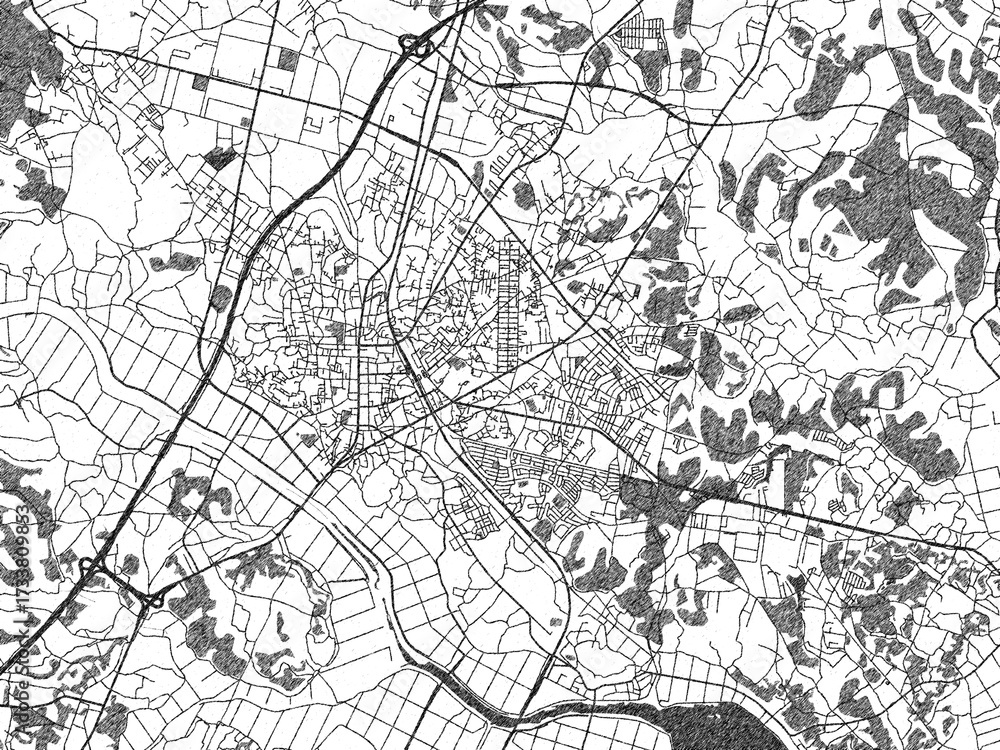 Naklejka premium Hand-drawn style black and white city map of Ishioka, Japan, with detailed streets and textures.