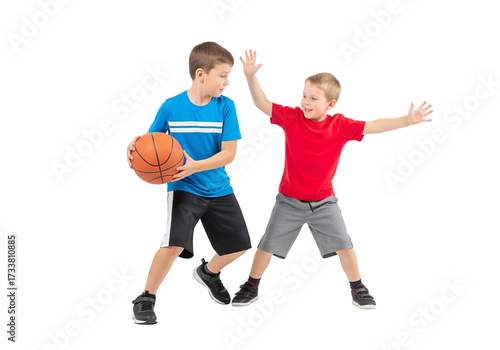 Two Young Boys Playing Basketball: Dribbling and Defending in Action