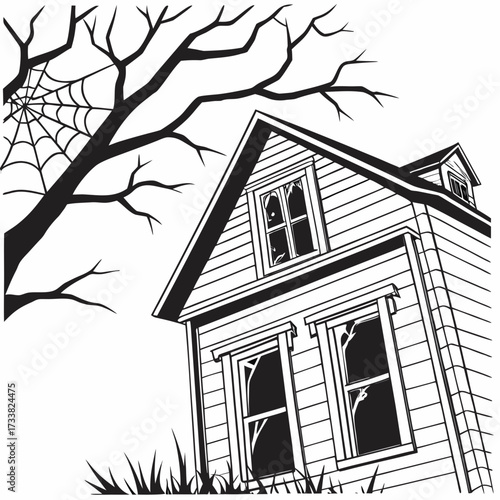 Spooky haunted house with bare tree and spiderweb scary