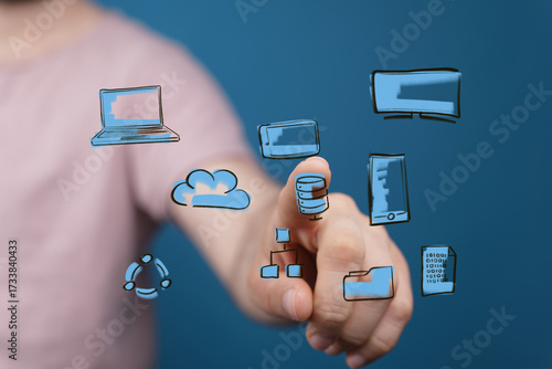 Hand pointing at digital ic...