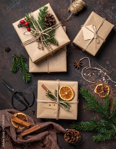  2026. Handmade Christmas gift boxes on a brown table. background from above. Merry Christmas greeting card, frame