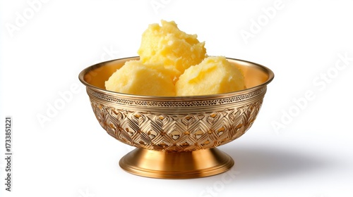 Golden Butter: A bowl brimming with golden butter, an ode to culinary craftsmanship. the image captivates with its soft focus and vivid colors, celebrating the simple pleasures of life.