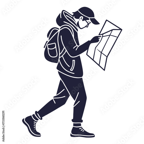 Dark blue silhouette of a person with backpack looking at a map