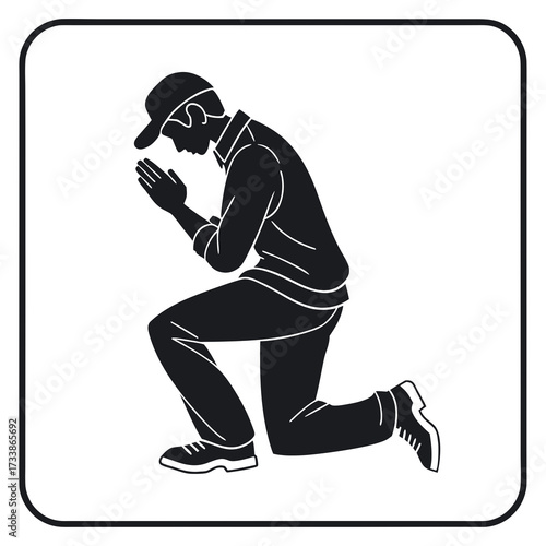 Man kneeling with hands clasped in prayer praying 1