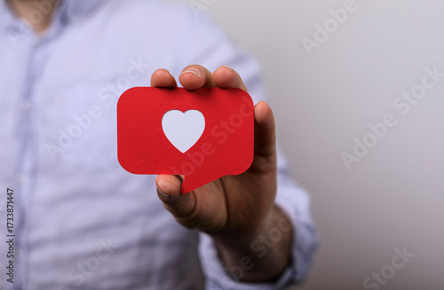 Image of a hand holding a r...