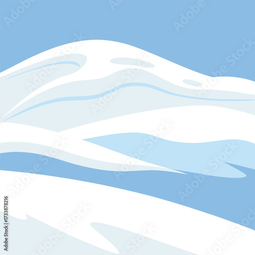 Abstract rolling snowdrifts under a clear sky
