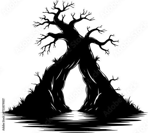 Silhouette of a twisted, ancient tree forming an archway over water