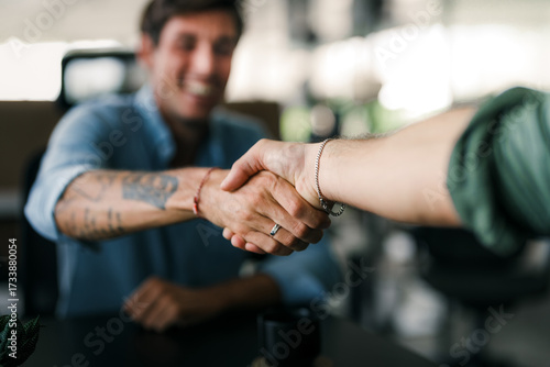 Modern, inclusive, and collaborative atmosphere in the office. They warmly welcome the new colleague