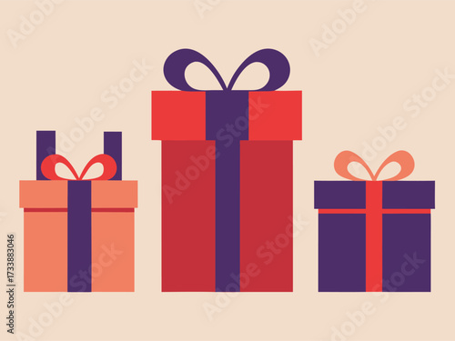 Three gift boxes with ribbons on a light background