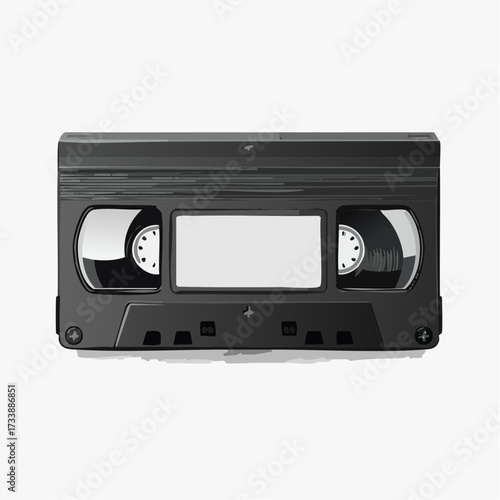 A black VHS video cassette tape with a blank white label, shown from the front and isolated on a white background.