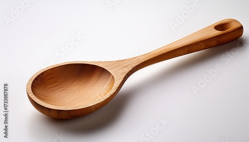 Wooden Spoon Placed On A White Background