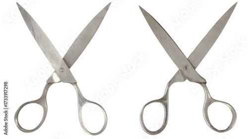 Two metallic scissors open on transparent png background